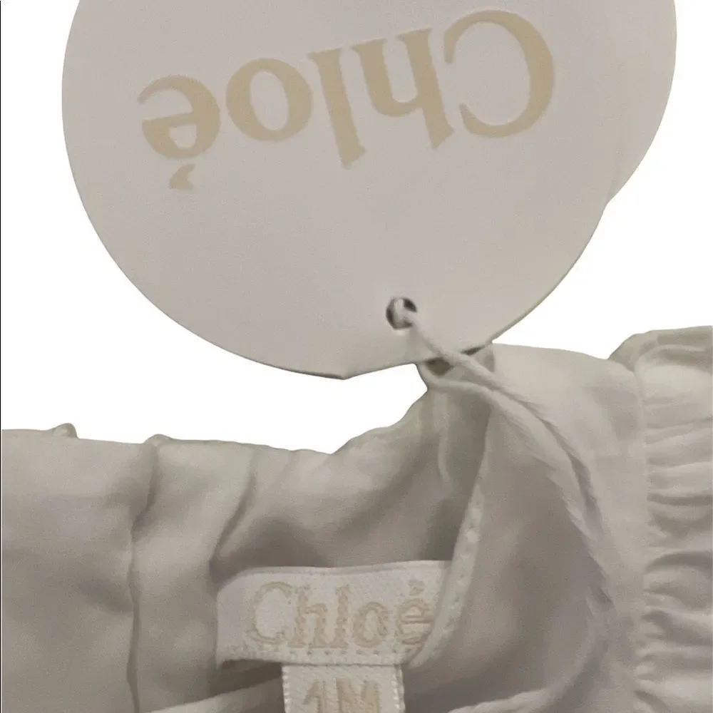 Chloé white lined eyelet dress lots of unique detail